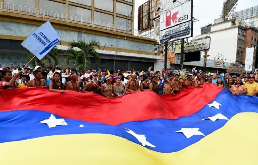 Ir para  <p>&nbsp;A oposi&ccedil;&atilde;o venezuelana e os apoiadores do governo fizeram novos protestos nesta quarta-feira nas principais cidades do pa&iacute;s em mais uma demonstra&ccedil;&atilde;o do embate social por...